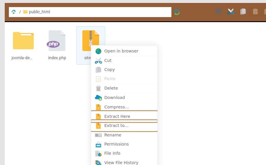 The right-click menu for a zip file in File Manager with Extract Here and Extract to outlined